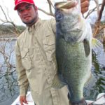 6-Guide-Niko-holding-Ron-Jrs-10lb-Picachos-giant-web