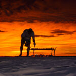 2026 fire on sand at sunset